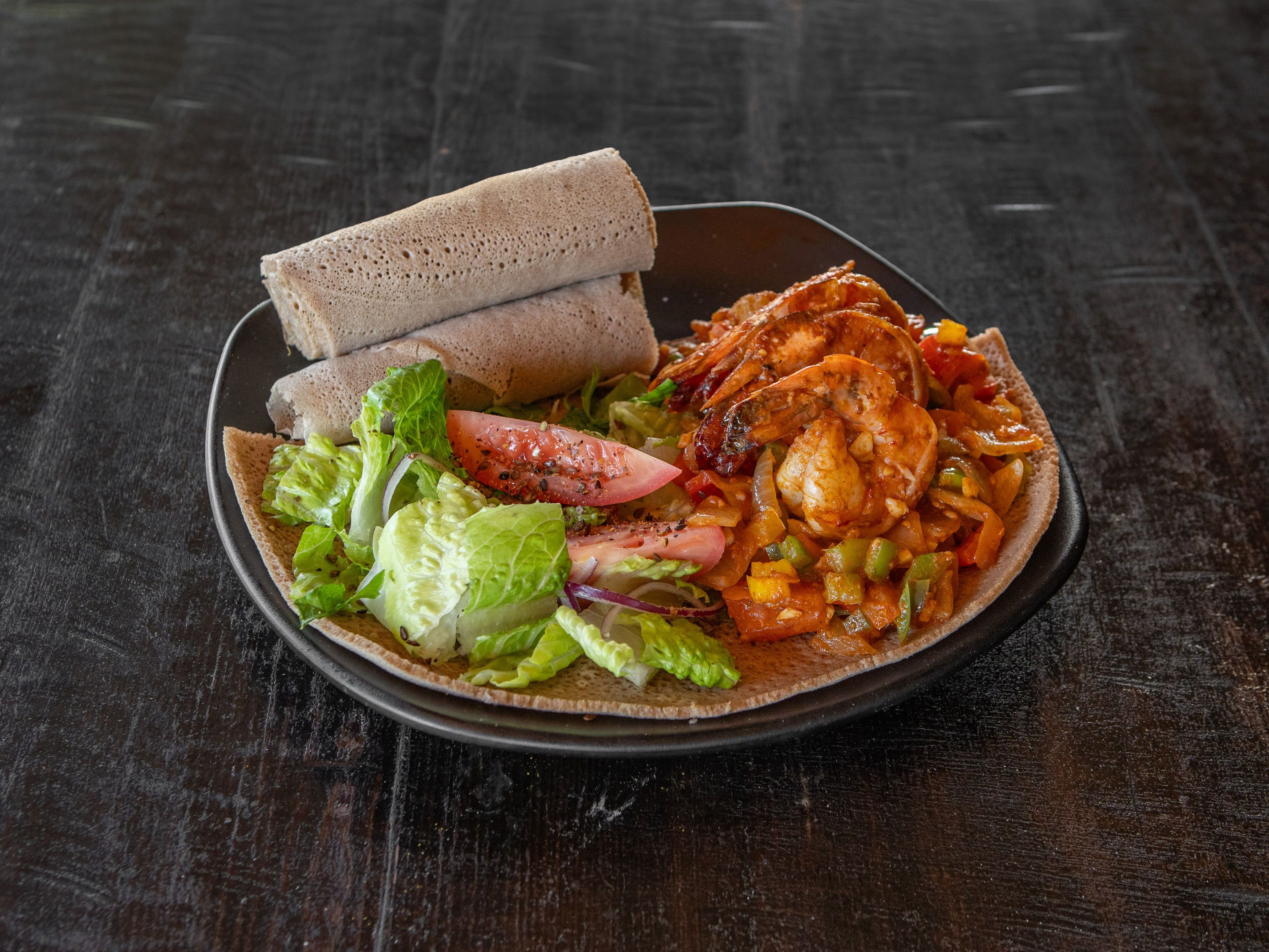 Prawn Kilwa – Sautéed Tiger Prawns.