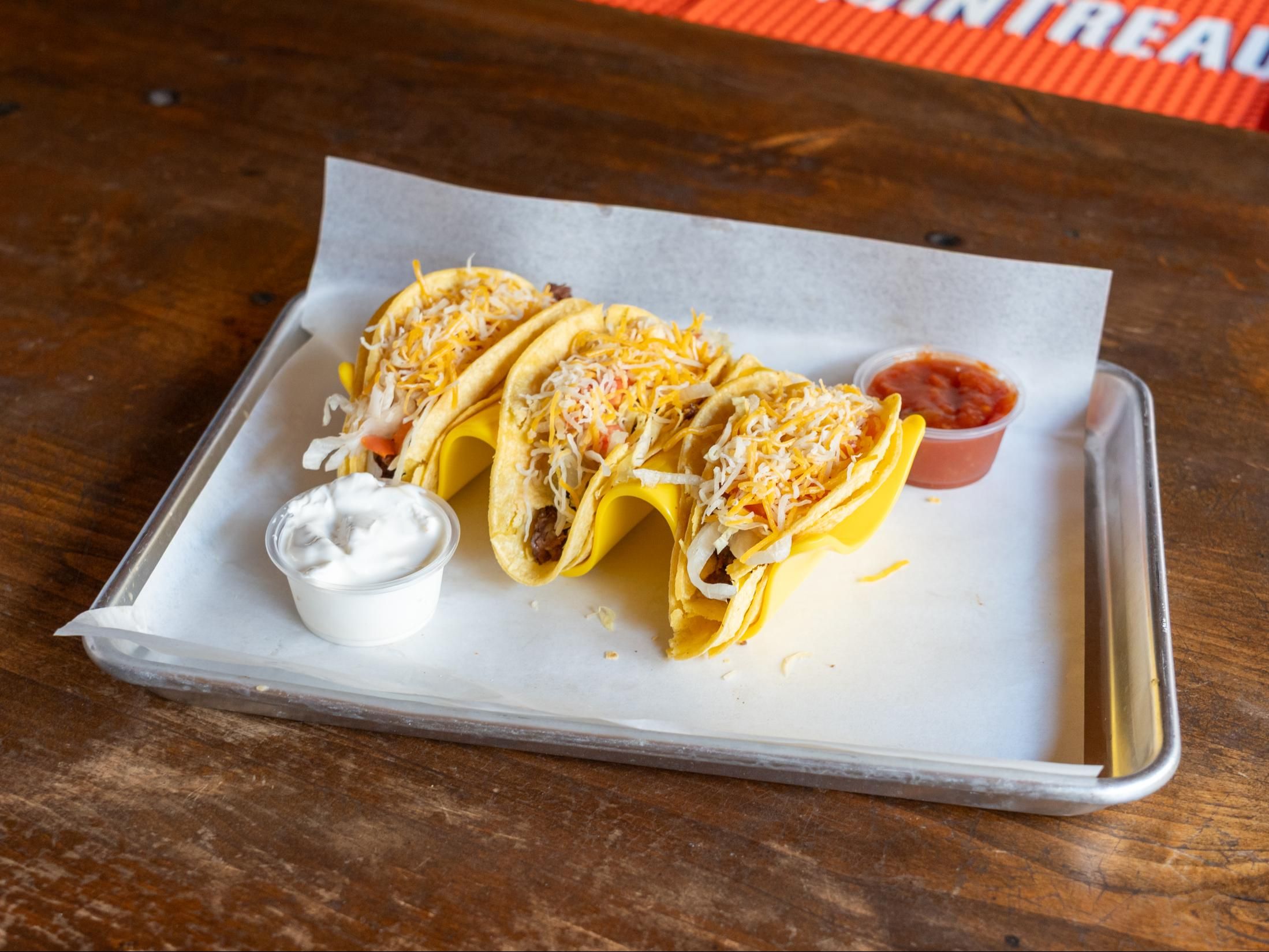 Tuesday Taco Special (3) (Chicken, Steak, Fish or Shrimp) Lettuce, Tomato, Shredded Cheese, Side of Sour Cream, Side of Salsa.