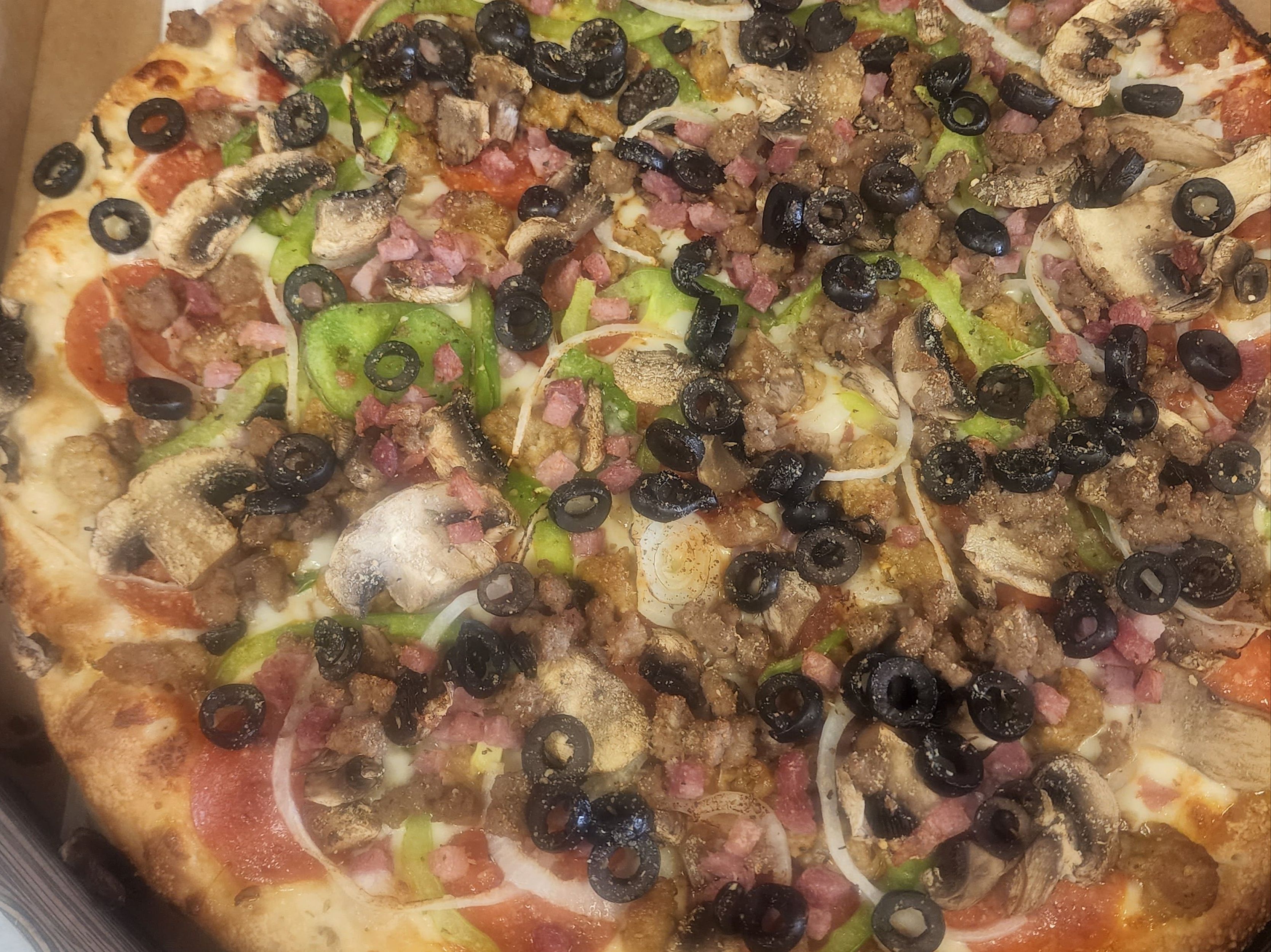 Buck's Super Deluxe Pizza.