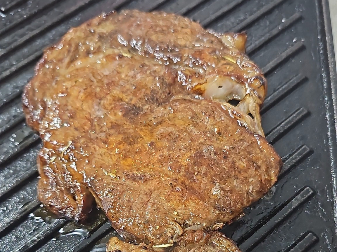 Ribeye Steak w/ 2 sides.