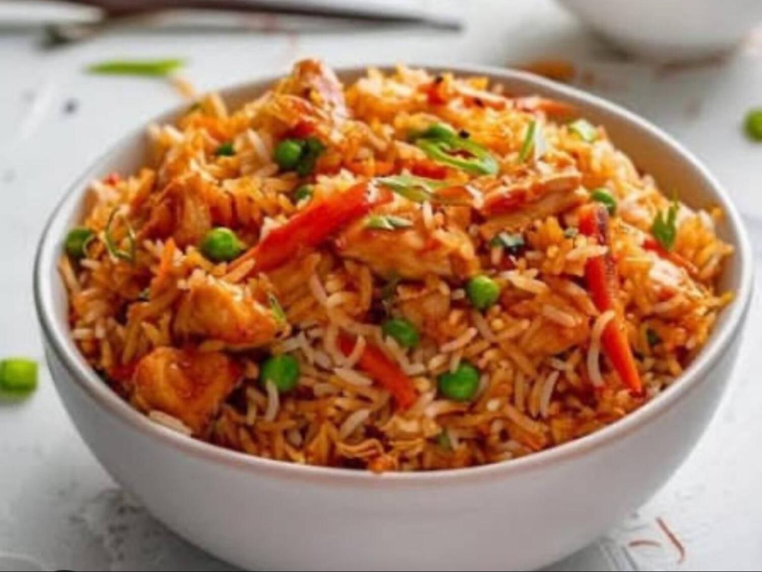 Schezwan Chicken Fried Rice.