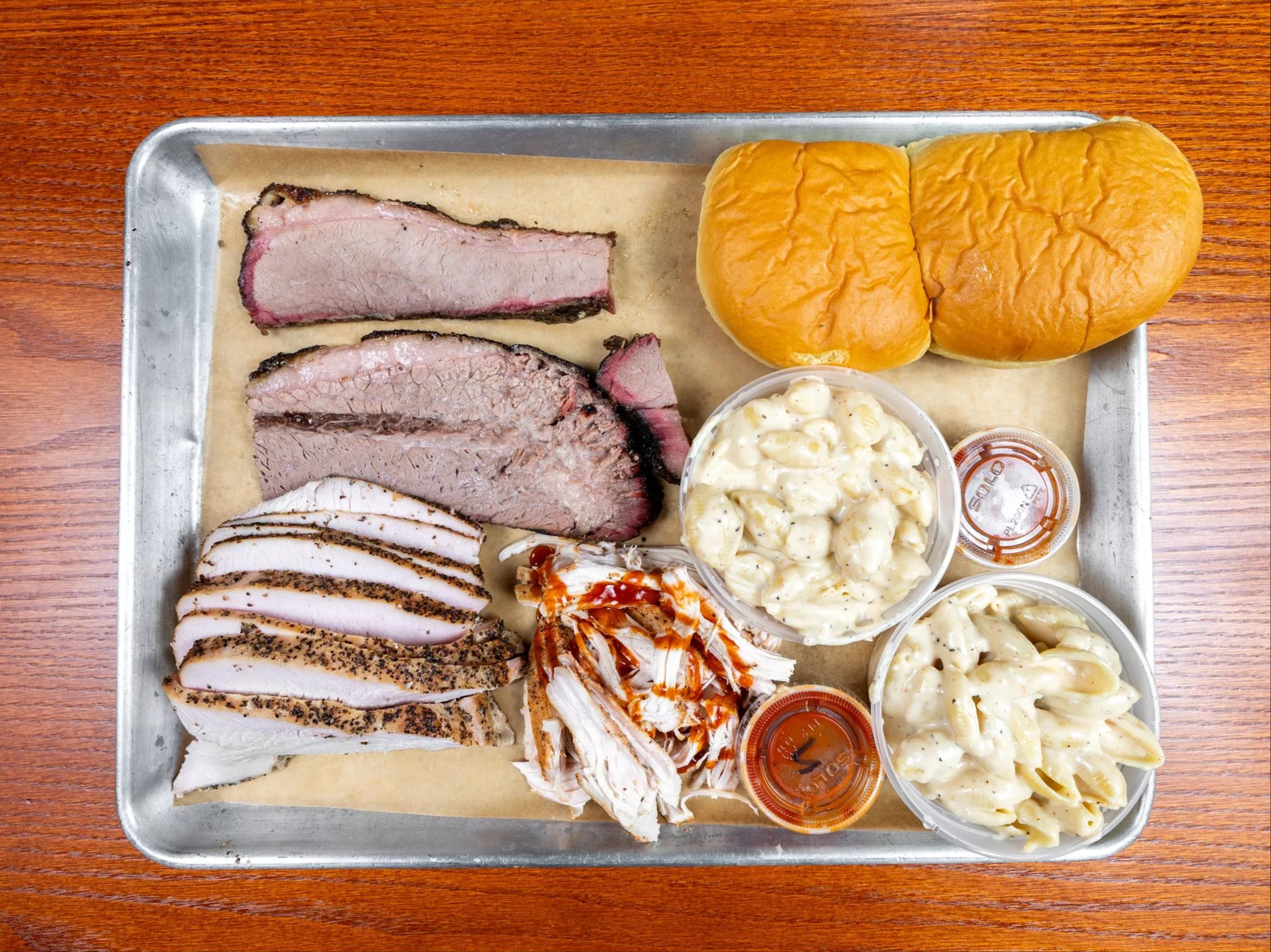 4 Meats + 2 Sides.