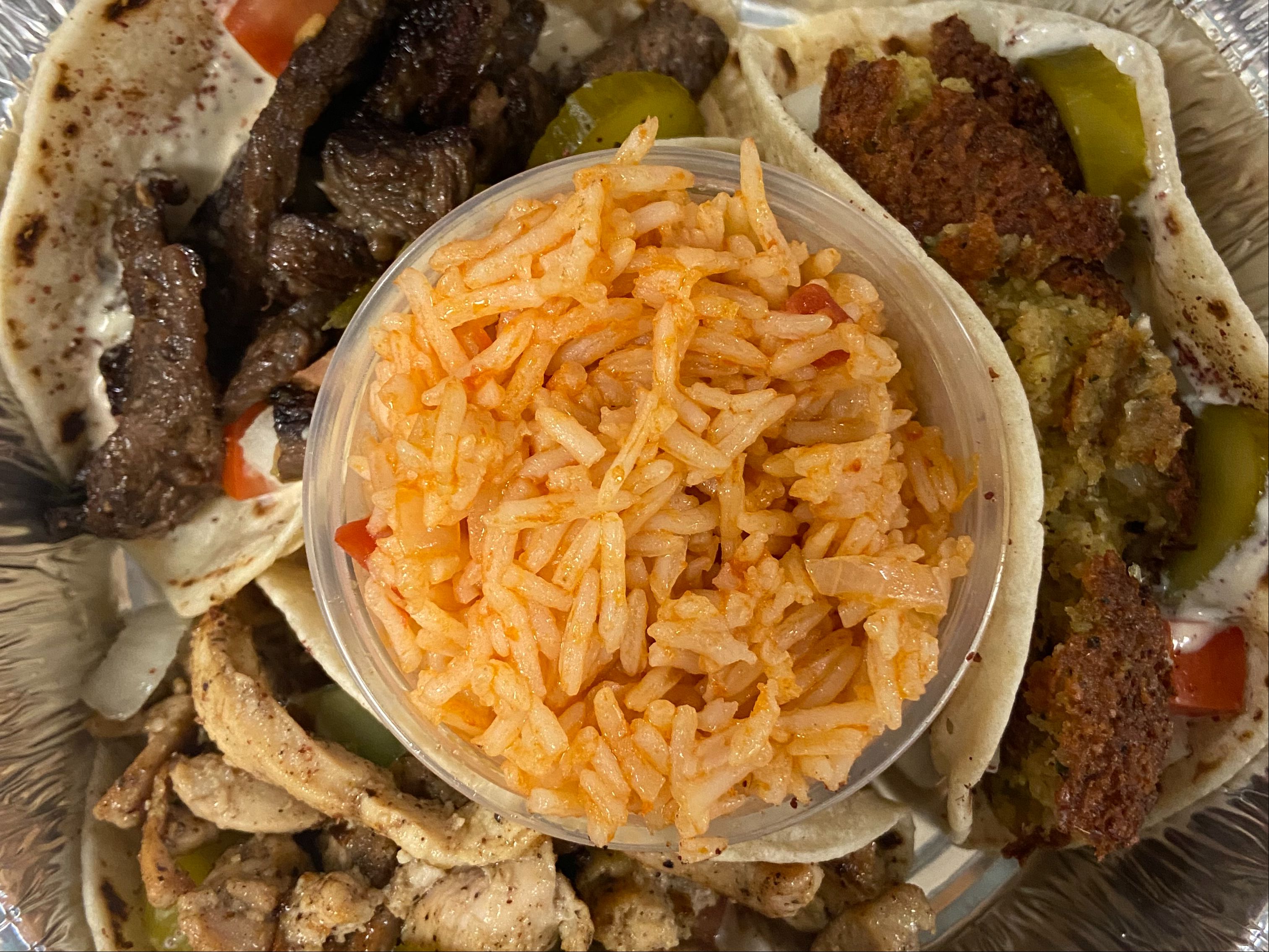 Taco Tuesday - 3 Tacos & Rice $10.