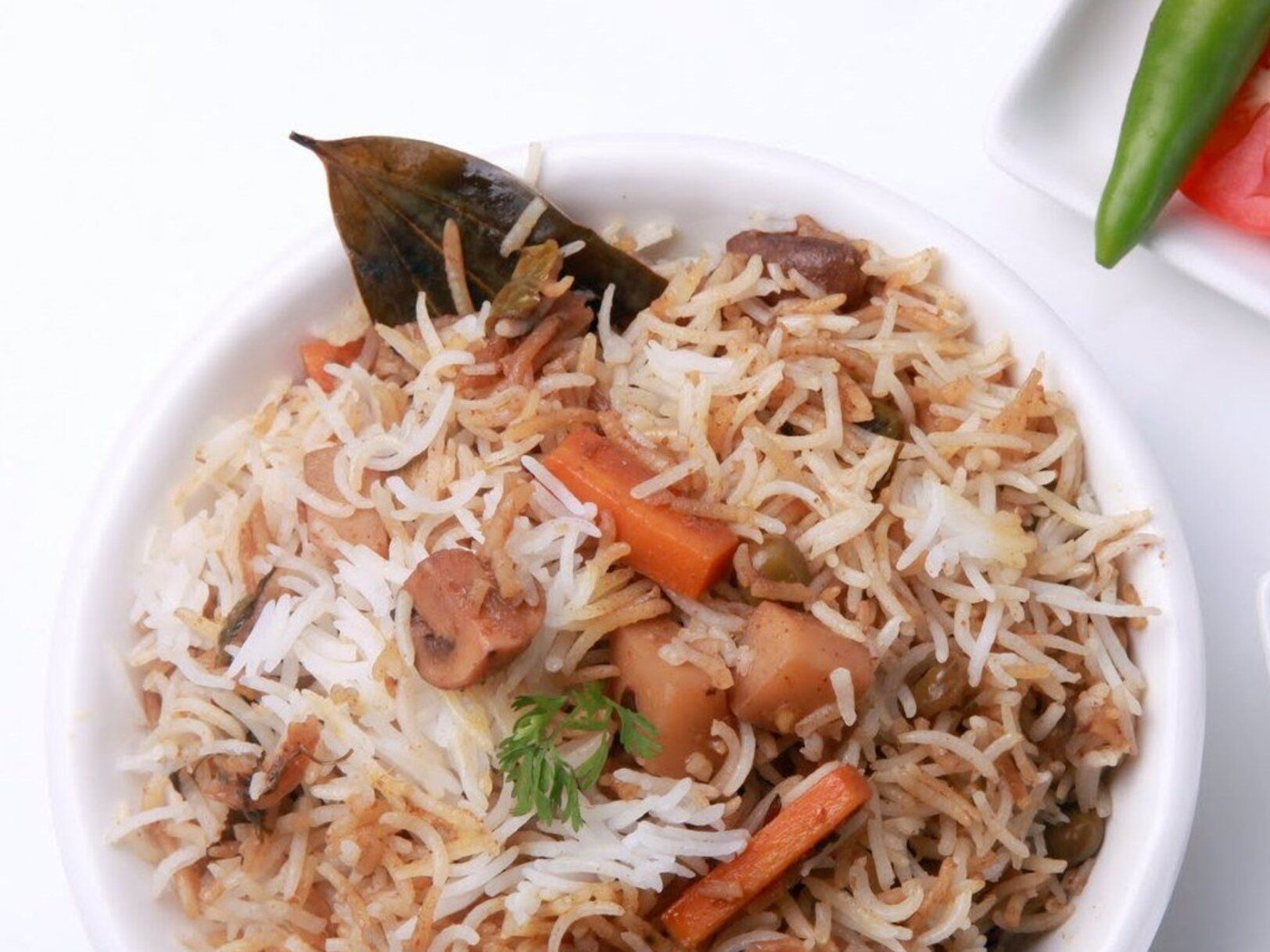 Paneer Ulavacharu Veg Biryani.