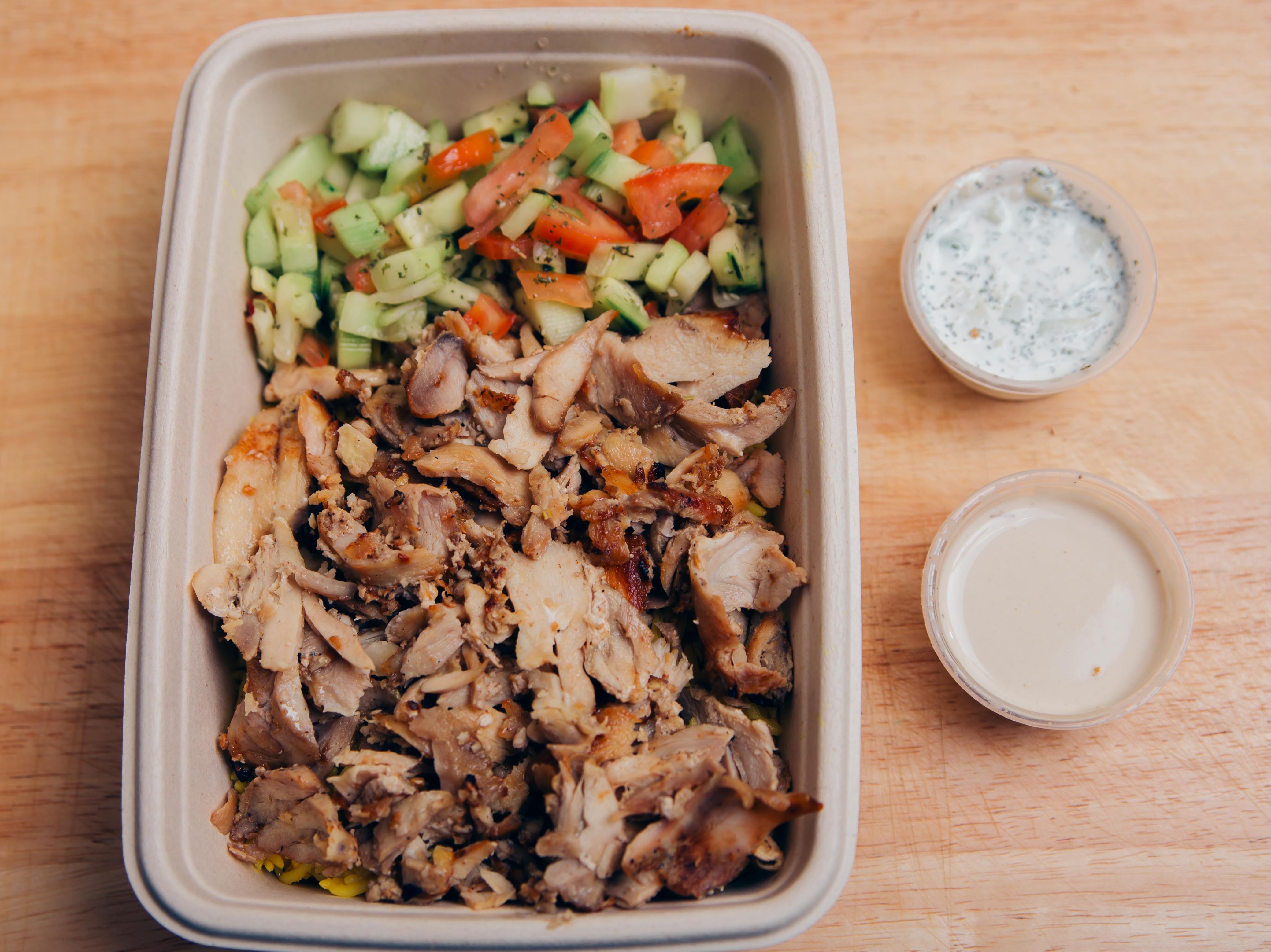 Chicken Shawarma Over Yellow Rice.