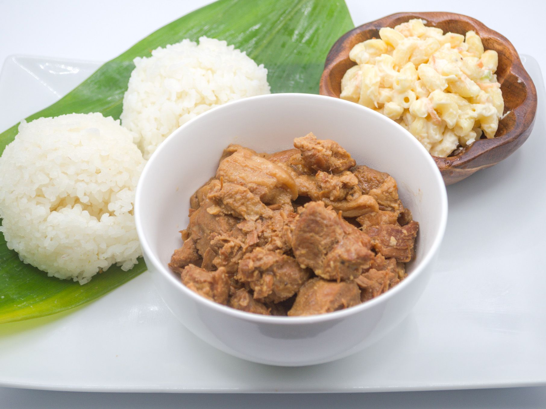 #13 Pork Adobo from Yama's Fish Market — Filipino-style braised pork simmered in shoyu, vinegar, garlic, and spices until tender. Served with white rice and mac salad.