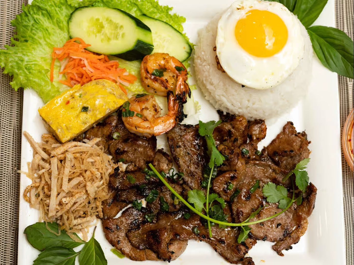 C74. Rice w/ Grilled Beef, Shrimp, Shredded Pork, Egg Cake, Egg.