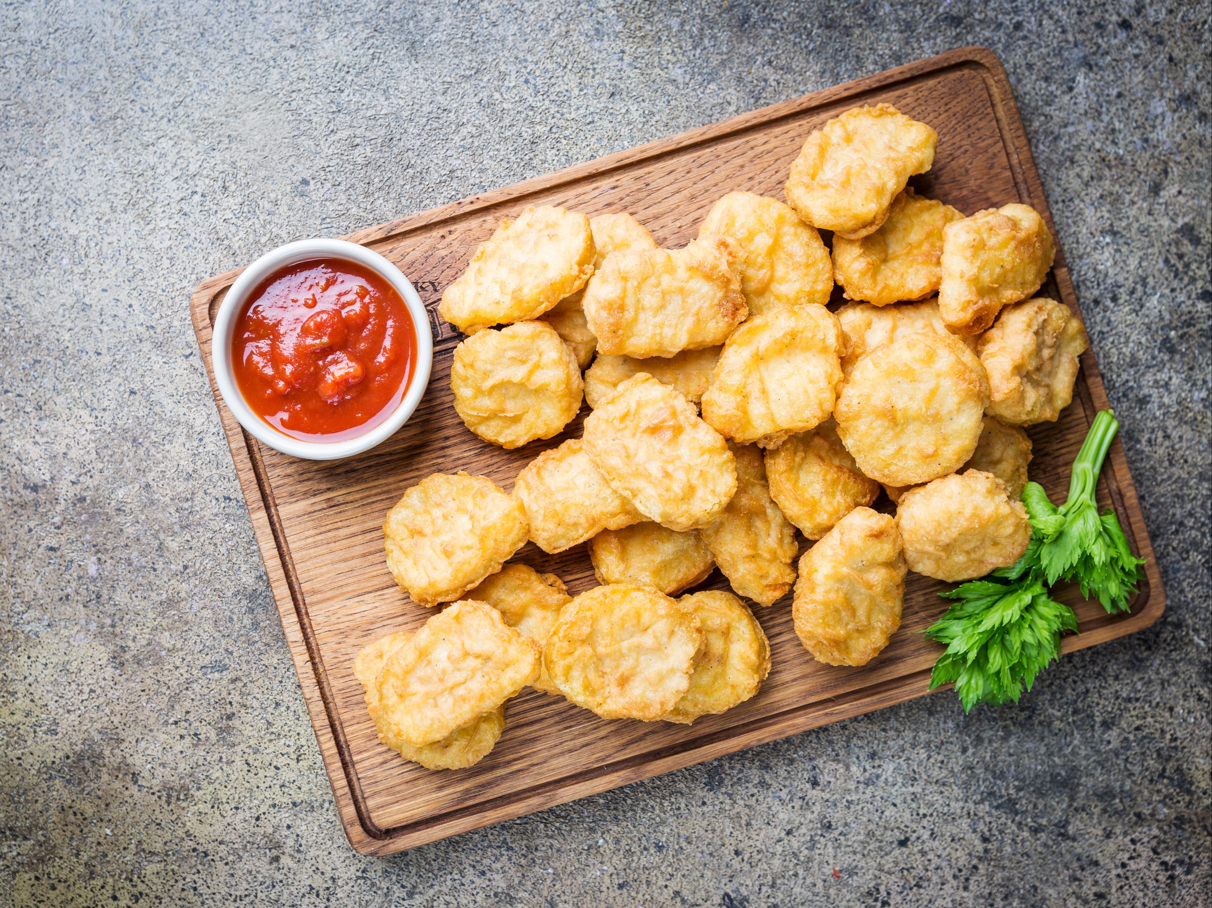 Kids Chicken Nuggets Served with Fries.