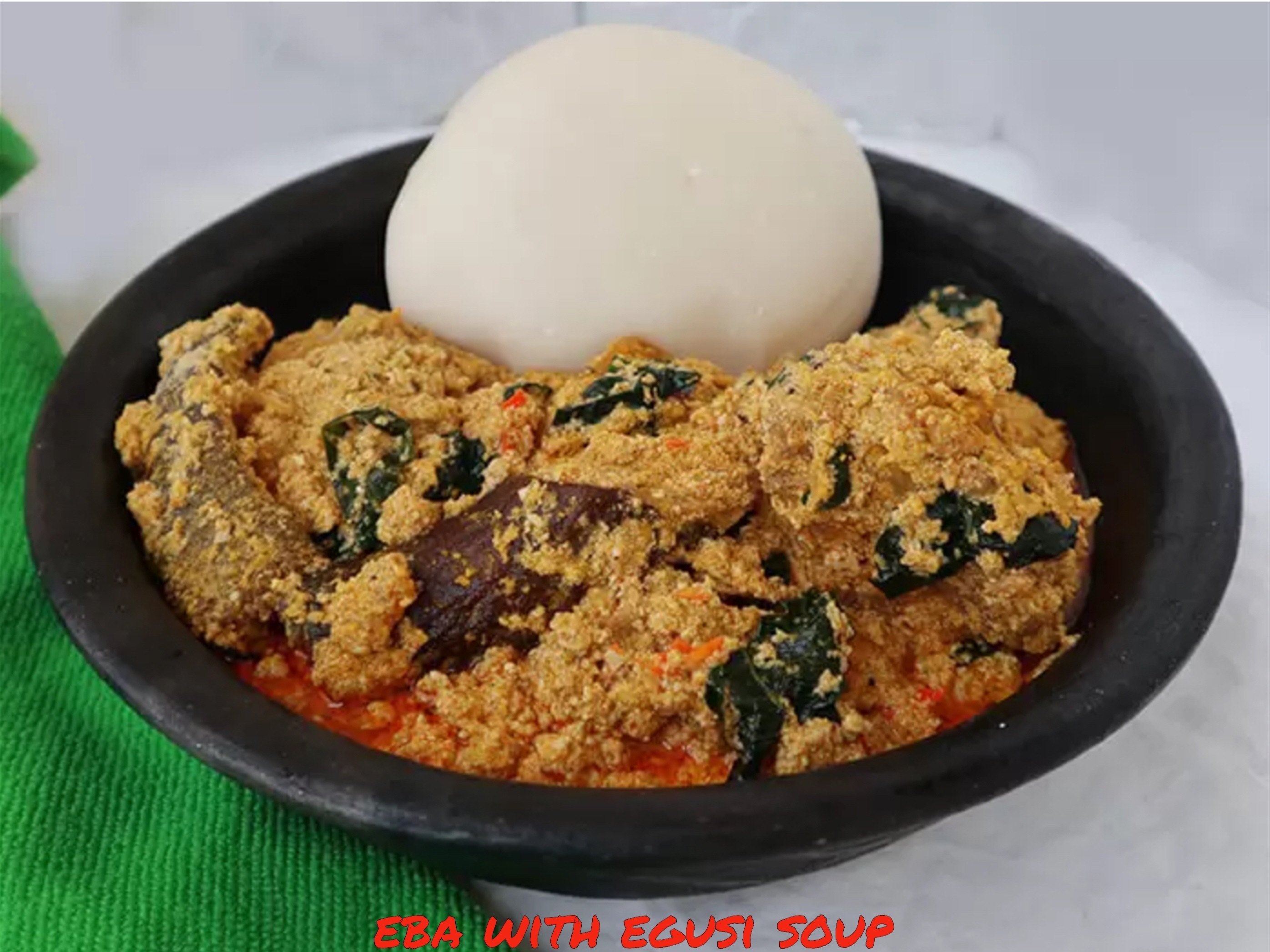 Eba w/ Egusi Soup.
