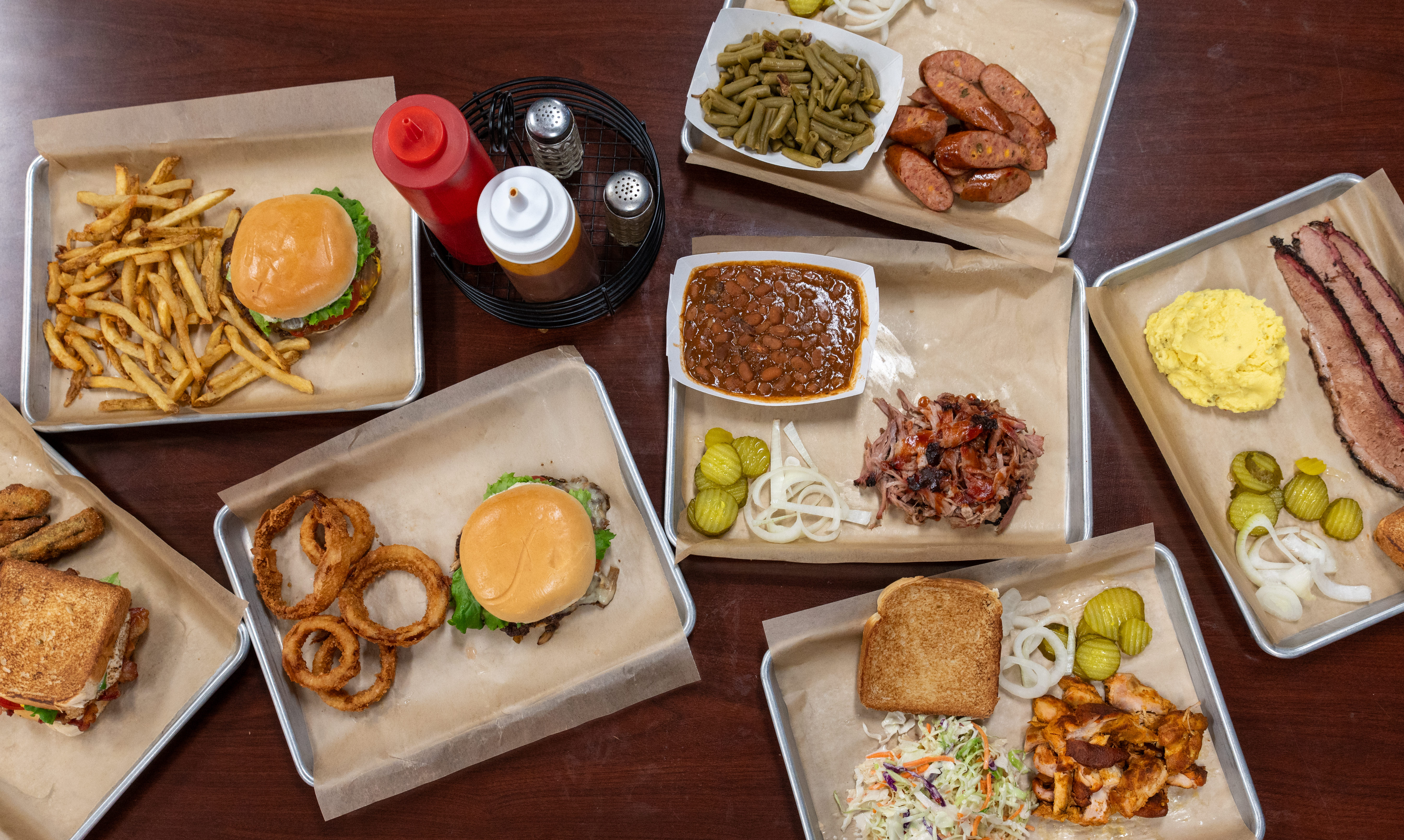 CREEK BOTTOM BURGERS & BBQ - About Us