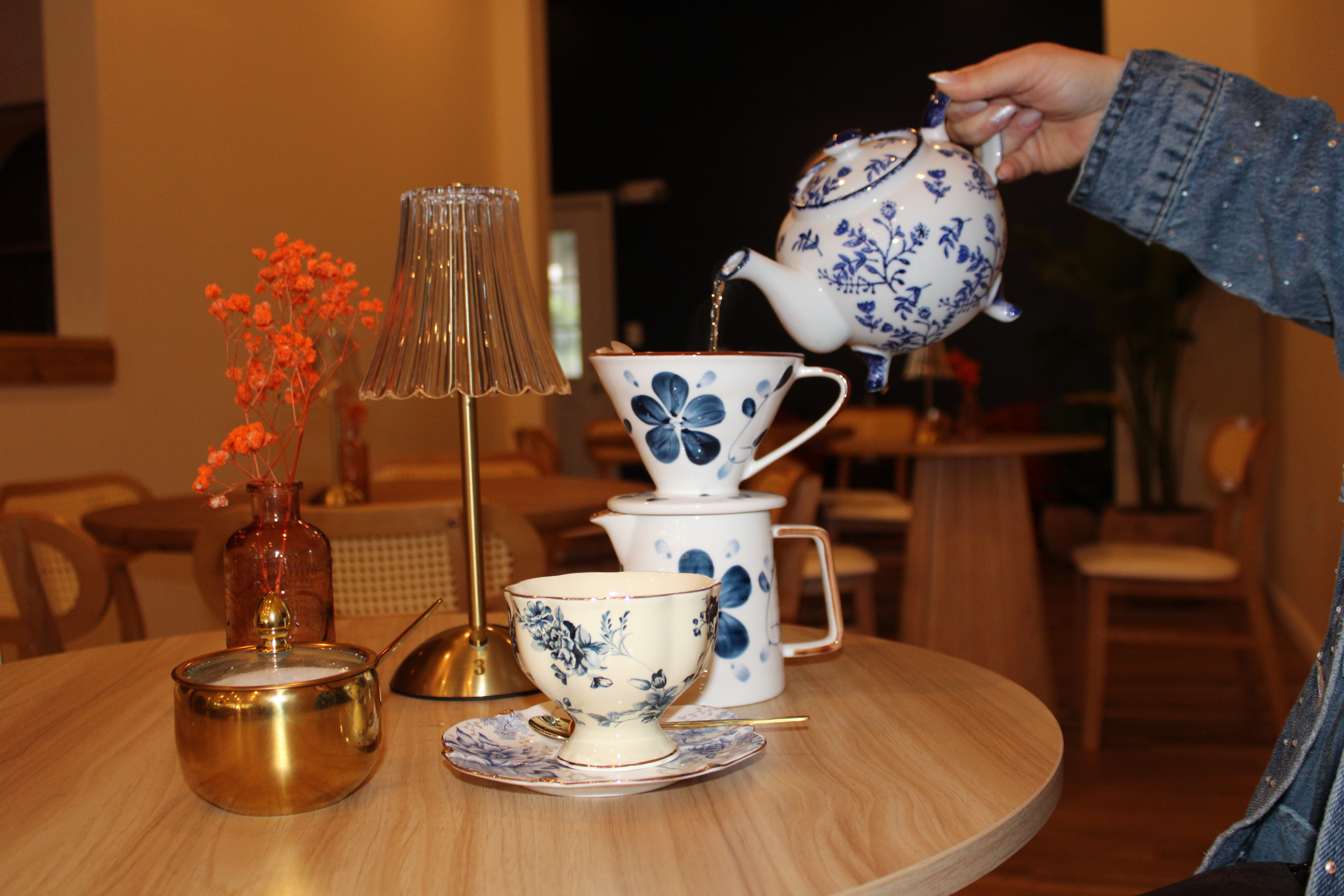 Blu Cafe is a contemporary haven in the heart of Kearny, inspired by the serene vibes of Tulum and elegance of Paris. Our space blends earthy tones, lush indoor gardens, and a warm, inviting ambiance.