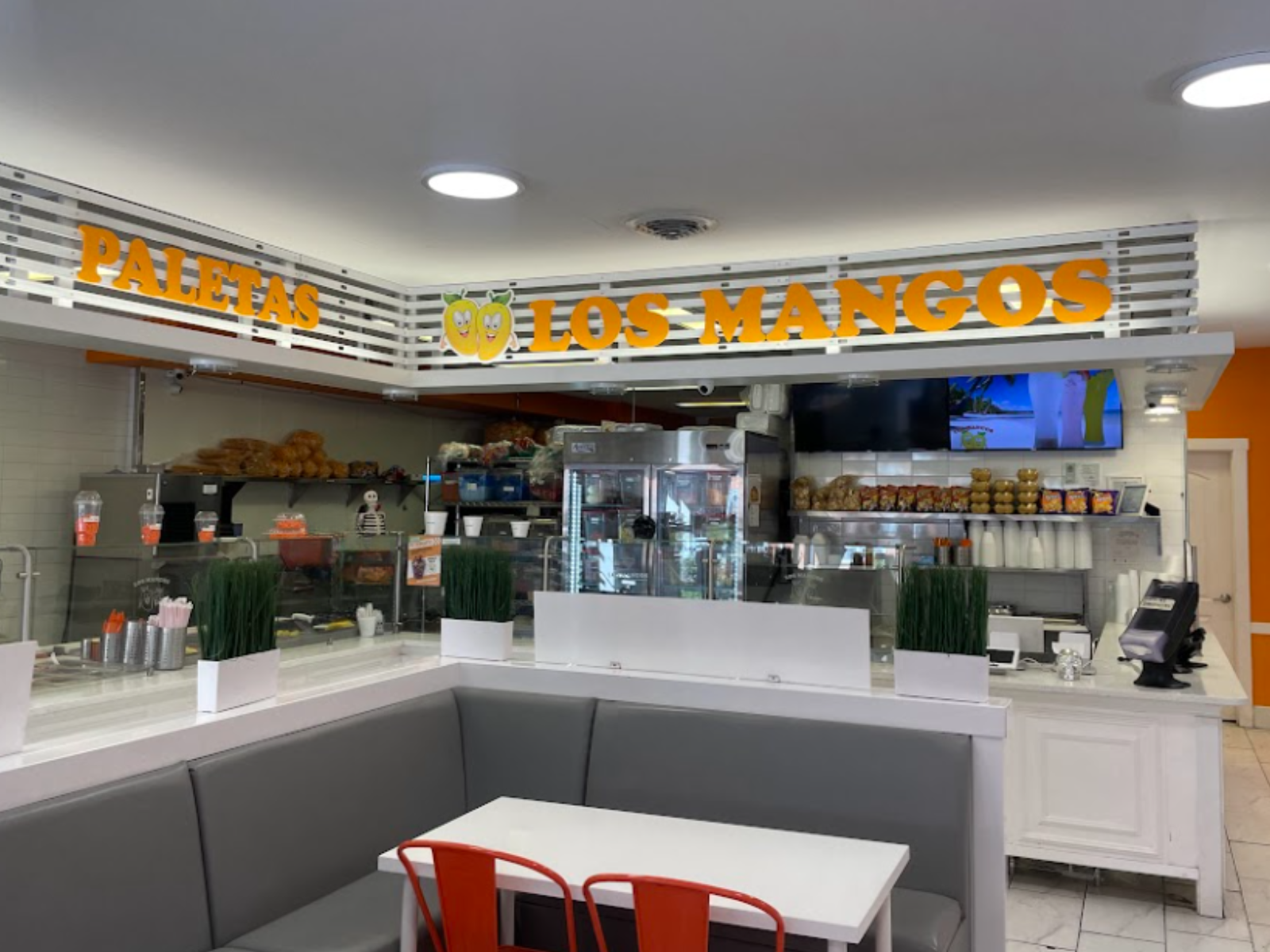 LOS MANGOS MIDWAY - About Us