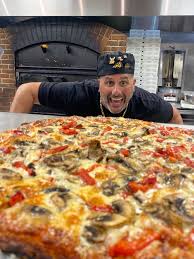 DOG HOUSE PIZZA - About Us