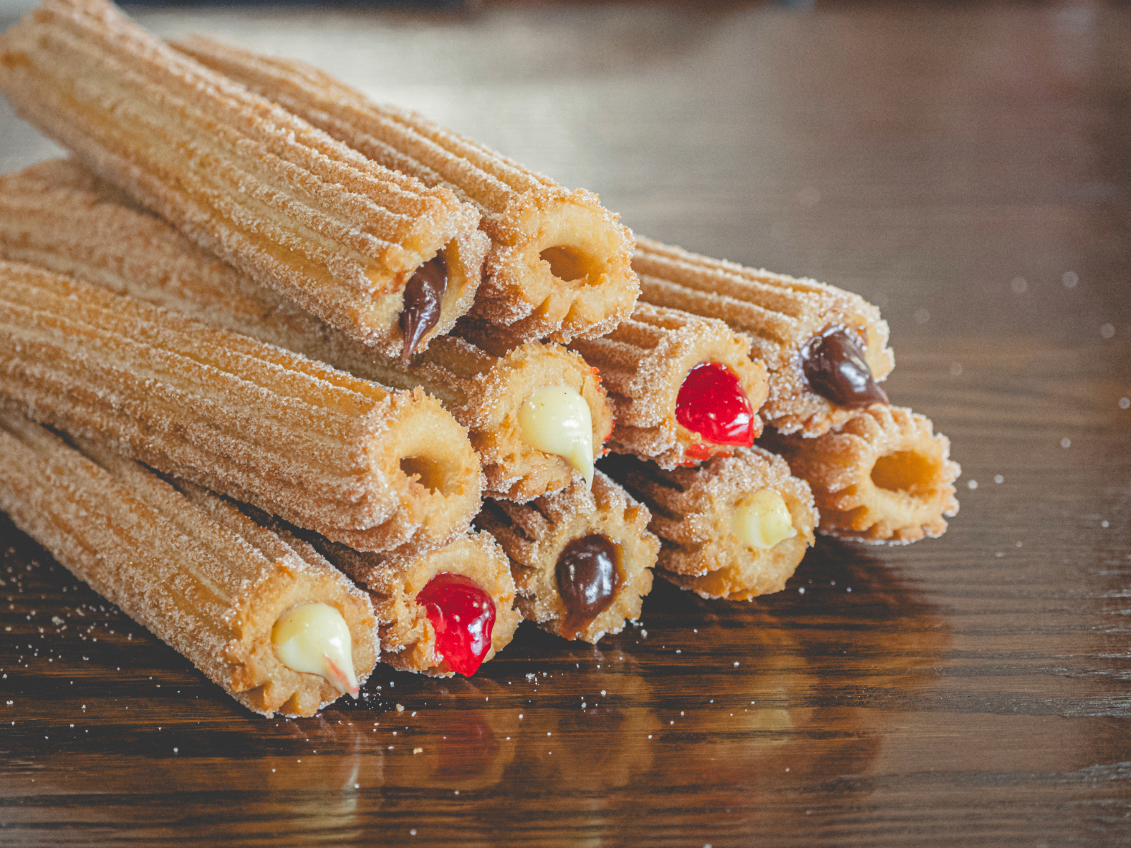 CHURROS Y CHOCOLATE - About Us