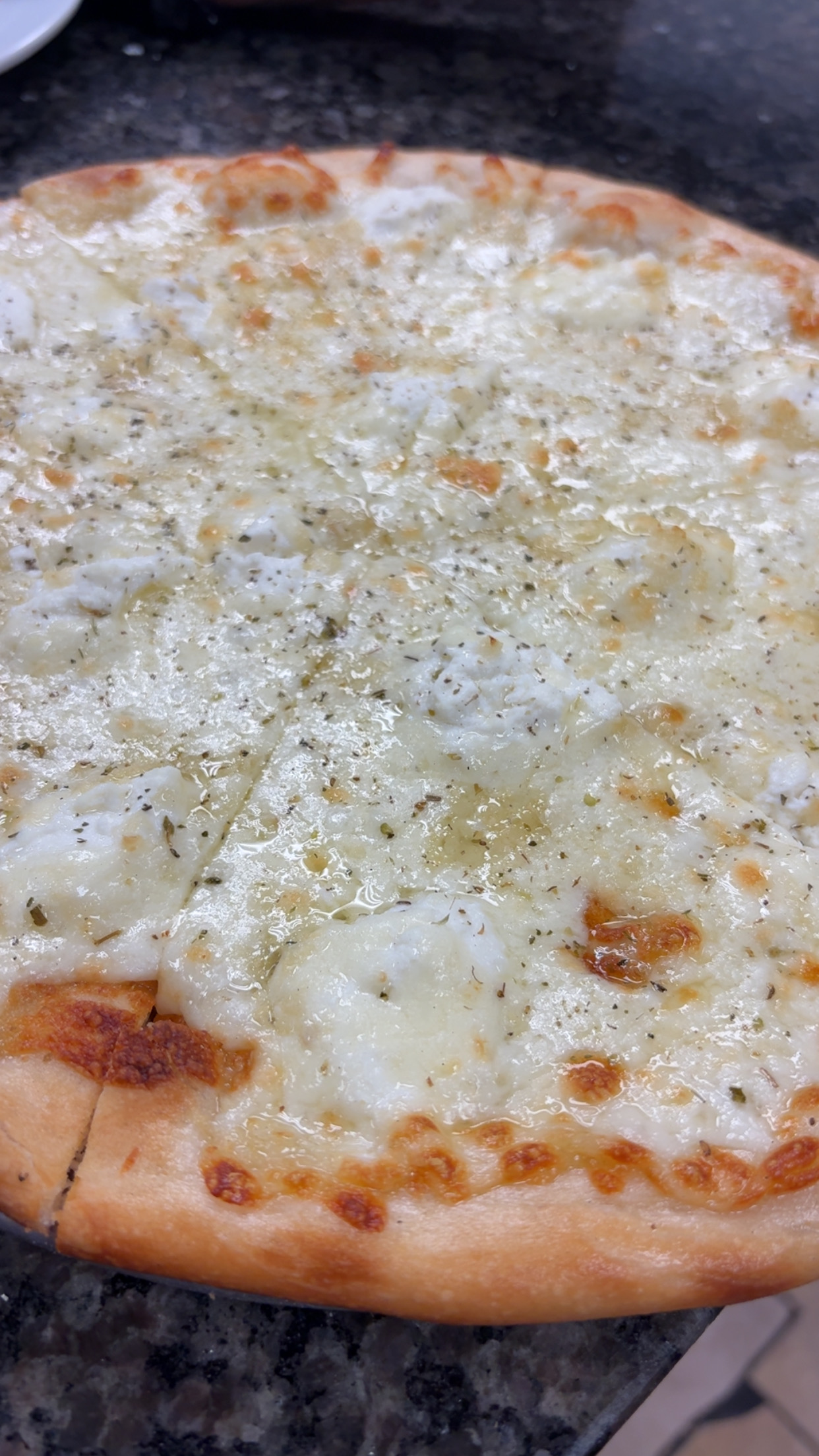 RICOS PIZZA ON 26TH - About Us